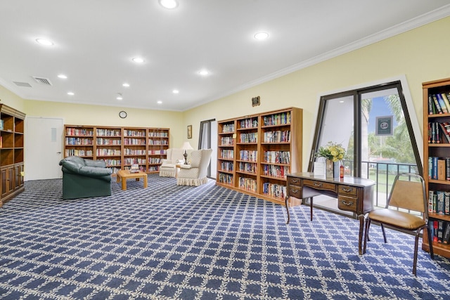 living area featuring carpet and ornamental molding