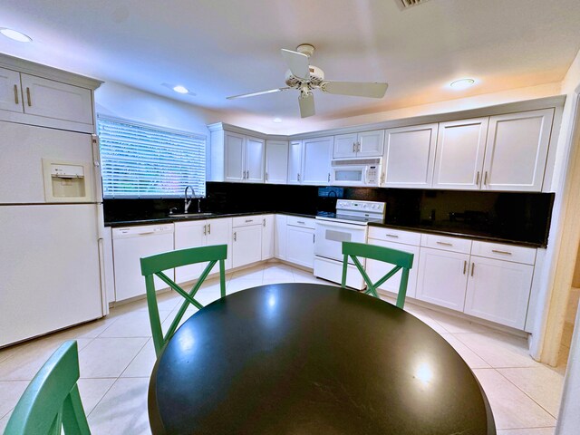 dining room with light tile patterned flooring