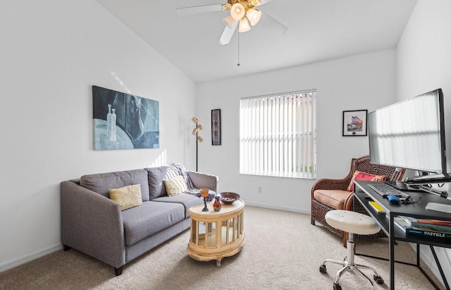 carpeted living room with vaulted ceiling and ceiling fan