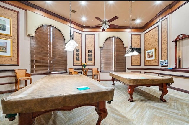 game room featuring parquet floors, pool table, ornamental molding, and ceiling fan