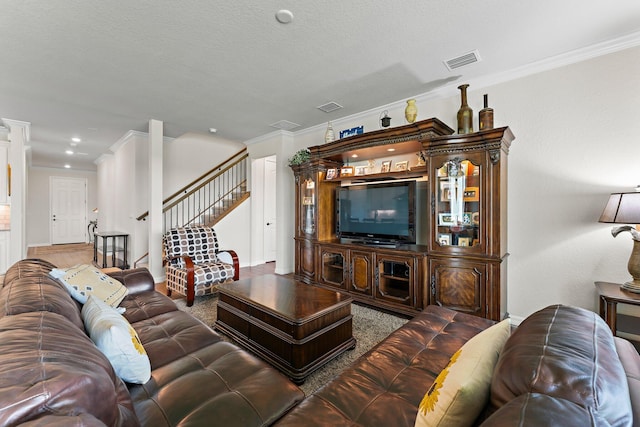 living room with dark hardwood / wood-style floors, crown molding, and a textured ceiling