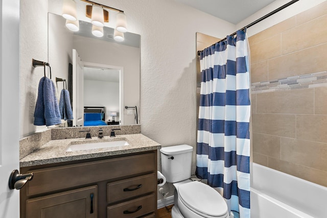 full bathroom with shower / bath combo with shower curtain, toilet, and vanity