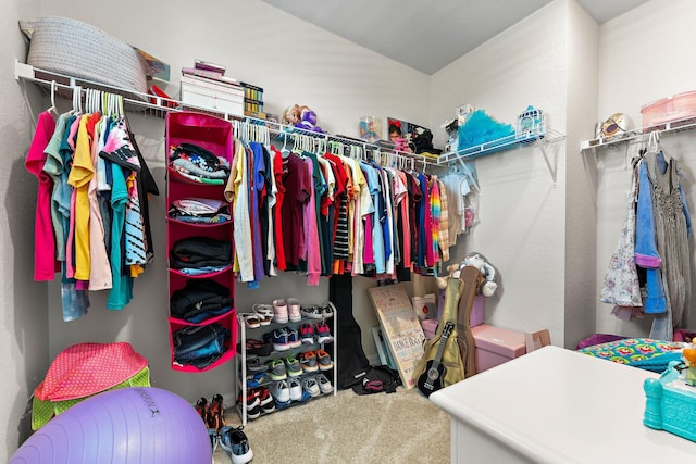 spacious closet with carpet floors