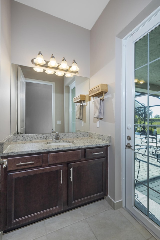 bathroom featuring tile patterned floors and vanity