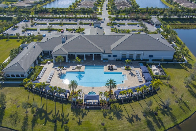 birds eye view of property featuring a water view