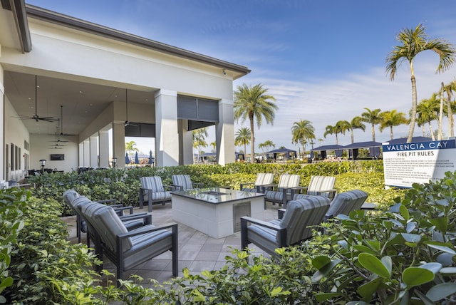 view of patio featuring ceiling fan