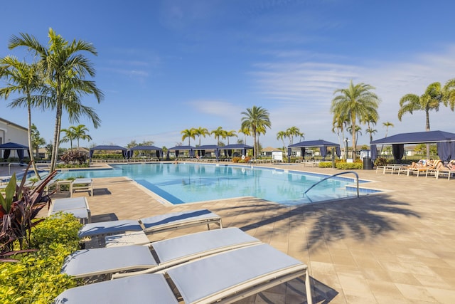 view of swimming pool featuring a gazebo and a patio