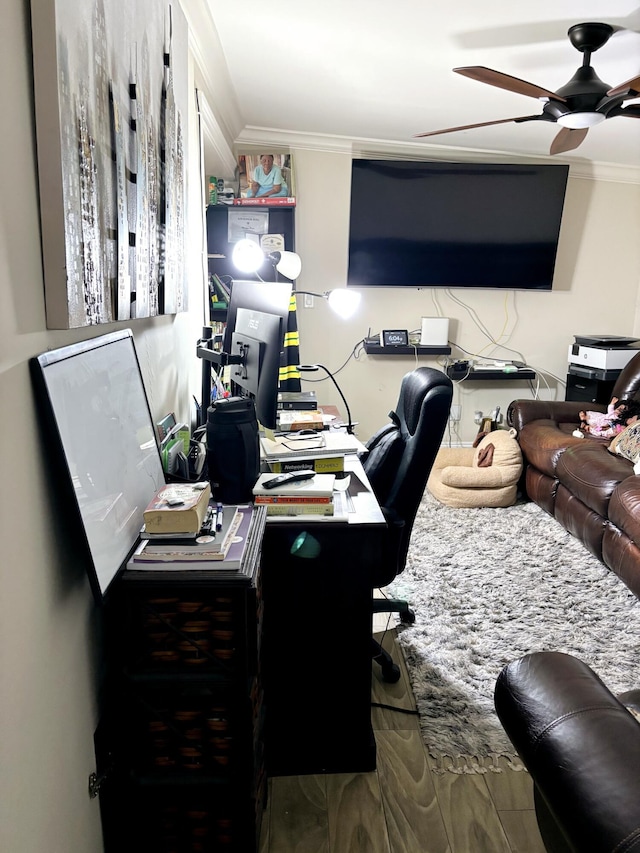 office area with ornamental molding and ceiling fan