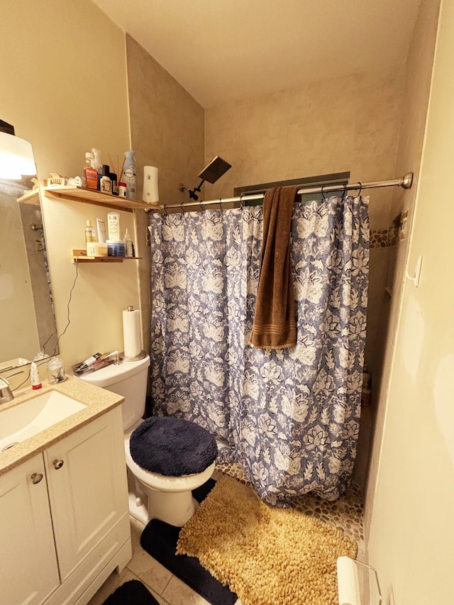 bathroom with vanity, toilet, and a shower with shower curtain