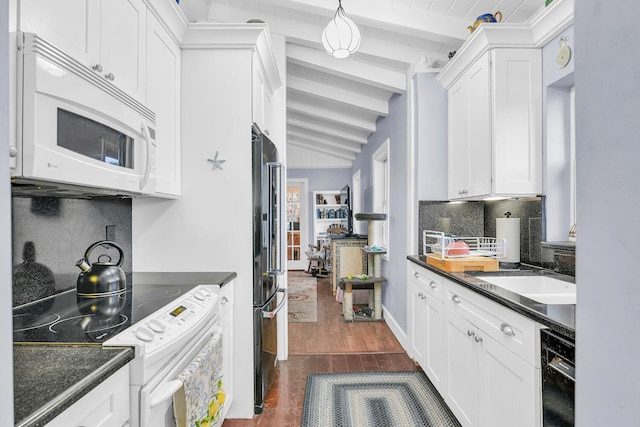 kitchen featuring decorative backsplash, white cabinets, dark hardwood / wood-style floors, and black appliances