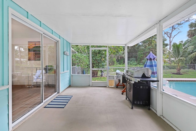 unfurnished sunroom with a wealth of natural light