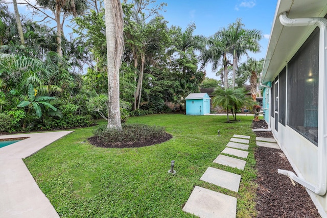 view of yard with a storage shed