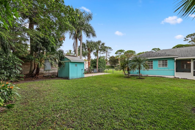 view of yard featuring a storage shed