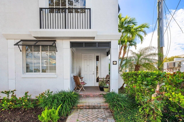 property entrance with a balcony