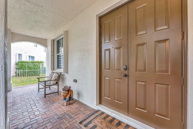 entrance to property with covered porch