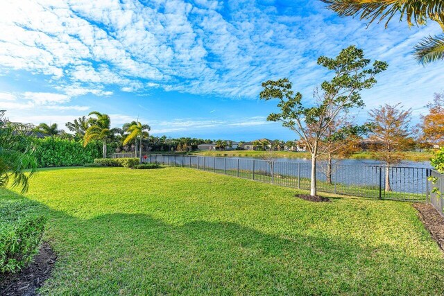 view of yard with a water view