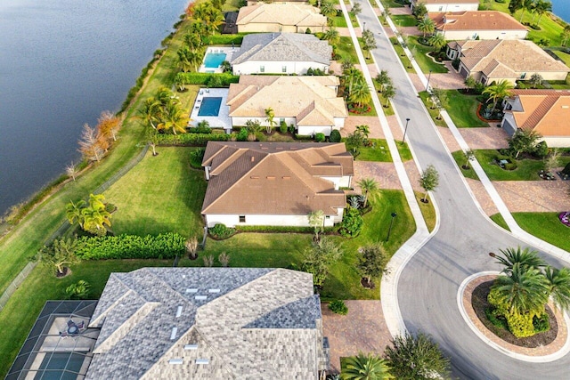 bird's eye view with a water view