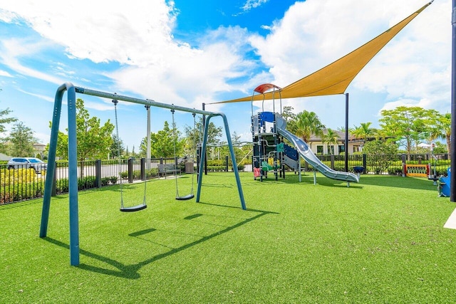 view of play area featuring a lawn