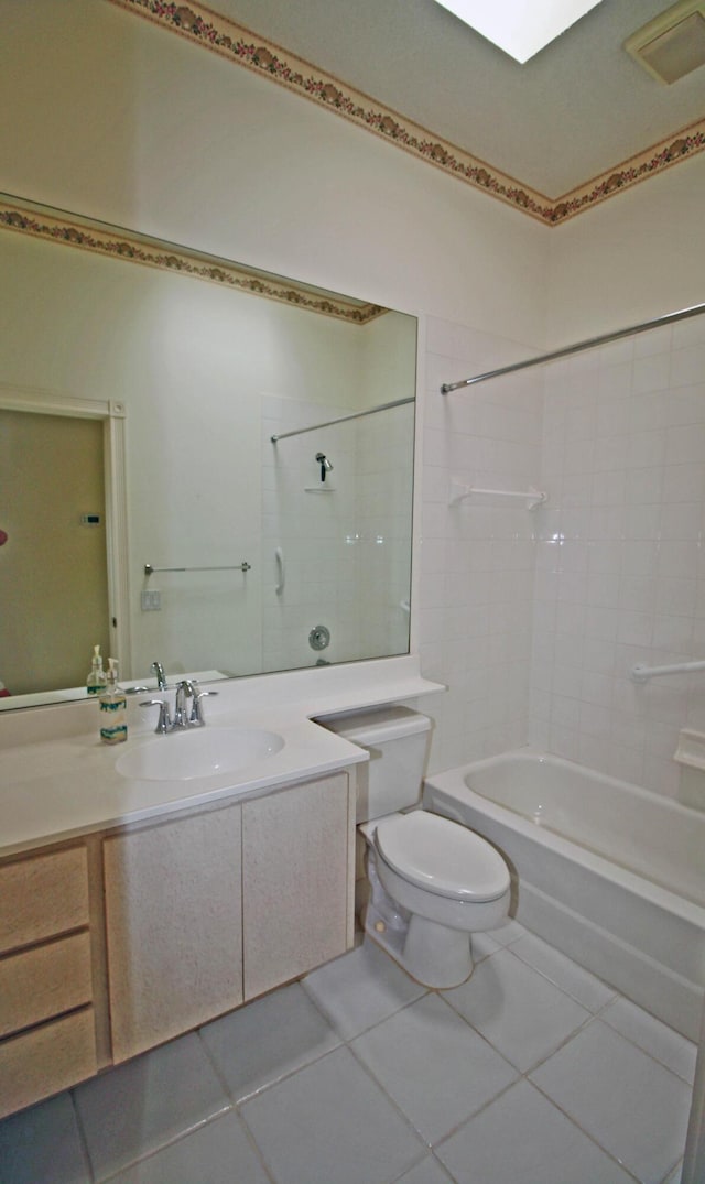 full bathroom with  shower combination, toilet, tile patterned floors, and vanity