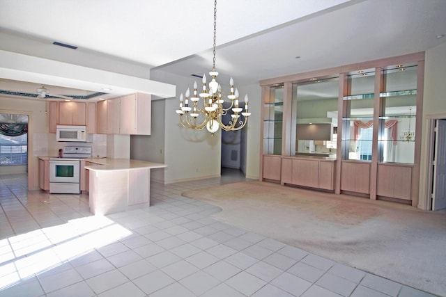 kitchen featuring light colored carpet, a notable chandelier, pendant lighting, decorative backsplash, and white appliances