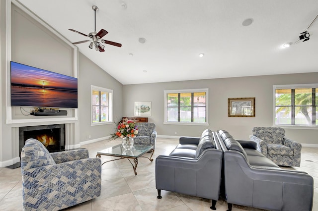 tiled living room with high vaulted ceiling and ceiling fan