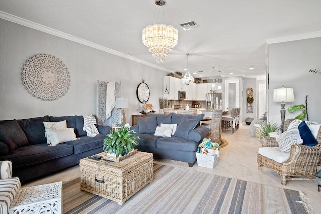 living room with light tile patterned floors, a notable chandelier, and ornamental molding