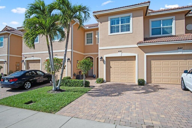 view of front of property with a garage