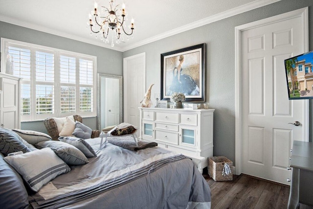 bedroom with dark wood-type flooring, ornamental molding, and a chandelier