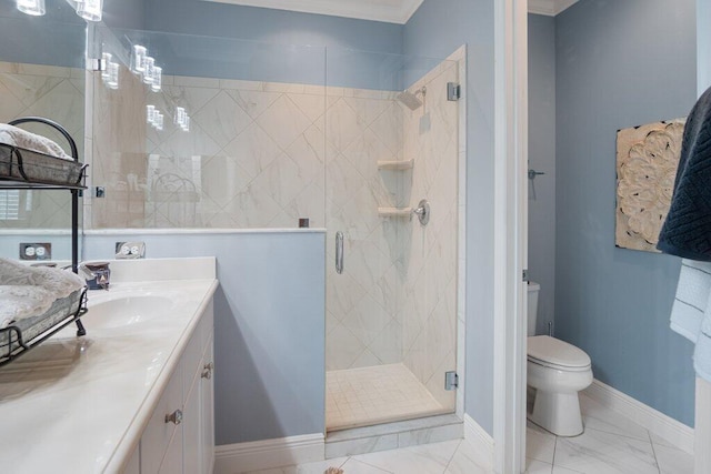 bathroom featuring toilet, an enclosed shower, and vanity