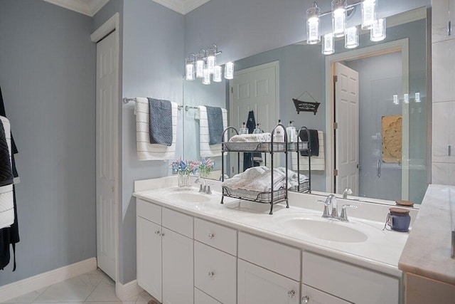 bathroom featuring vanity, ornamental molding, and tile patterned flooring