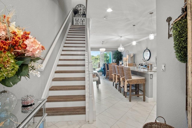 stairway with crown molding