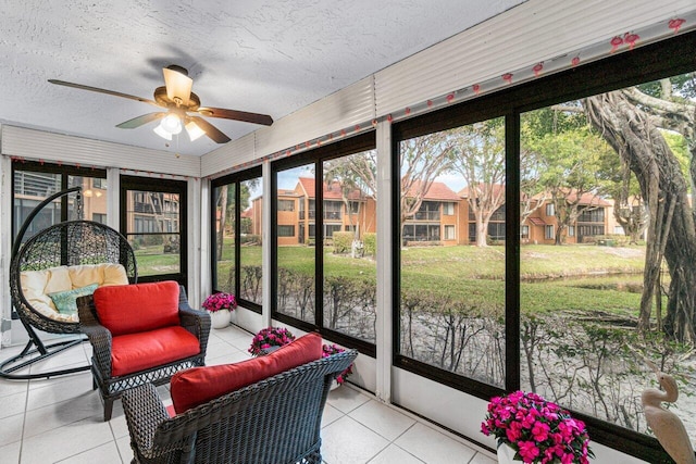 sunroom / solarium with ceiling fan