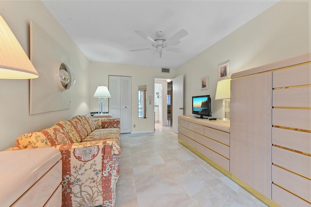 living room with ceiling fan