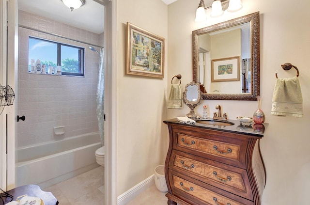 full bathroom featuring vanity, toilet, tile patterned flooring, and shower / bath combo with shower curtain