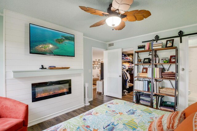 living room with wood-type flooring and a textured ceiling