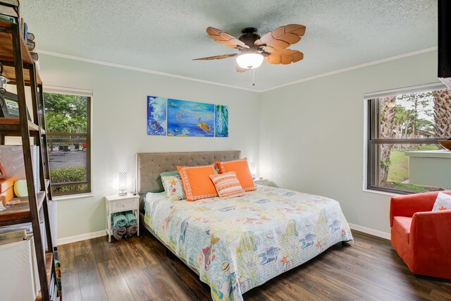 living room featuring ceiling fan, a textured ceiling, and hardwood / wood-style flooring