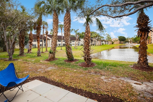 view of yard with a water view