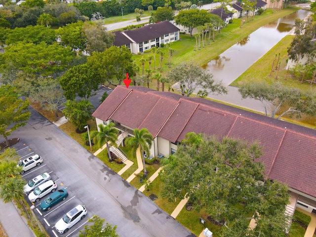 bird's eye view with a water view