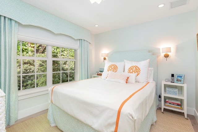 bedroom featuring light hardwood / wood-style flooring