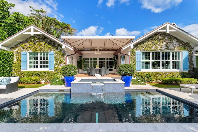 rear view of property with a patio area