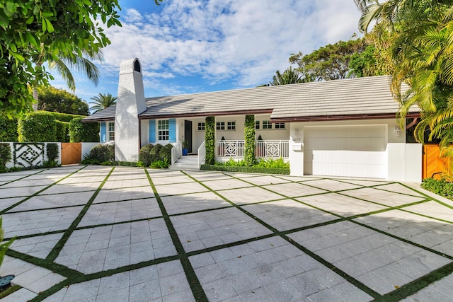 ranch-style home with a garage