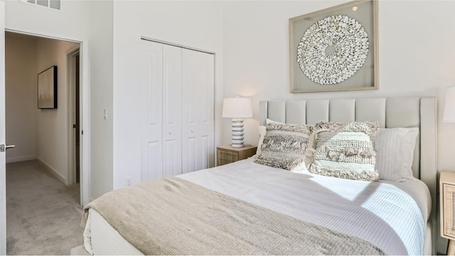 bedroom featuring a closet and carpet floors