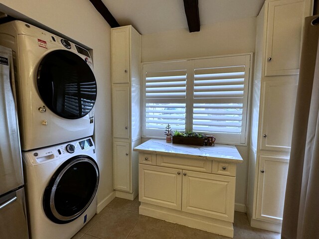 tiled bedroom featuring ceiling fan