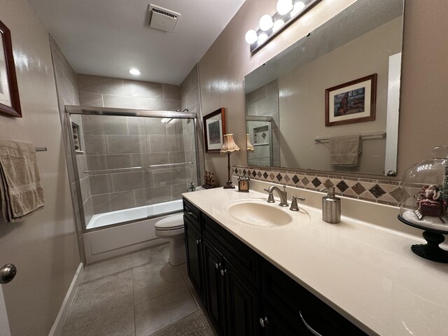 tiled home office with ceiling fan