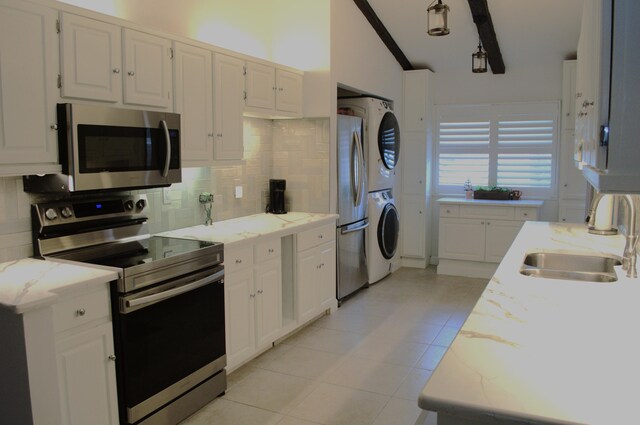 kitchen with white cabinetry, tasteful backsplash, decorative light fixtures, electric range oven, and sink