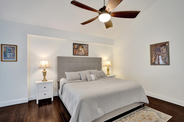 bedroom with ceiling fan, lofted ceiling, and dark hardwood / wood-style flooring