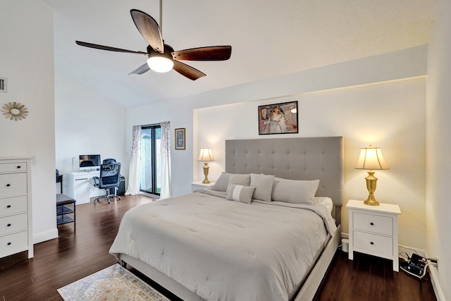 bedroom featuring lofted ceiling, dark wood-type flooring, and ceiling fan