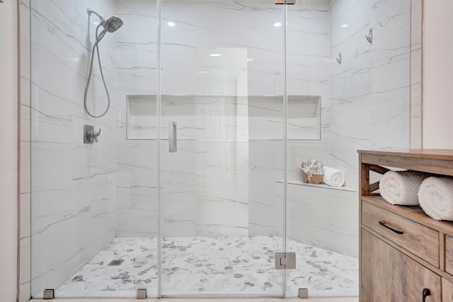 bathroom featuring an enclosed shower