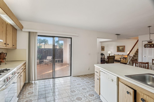 kitchen with sink and white appliances