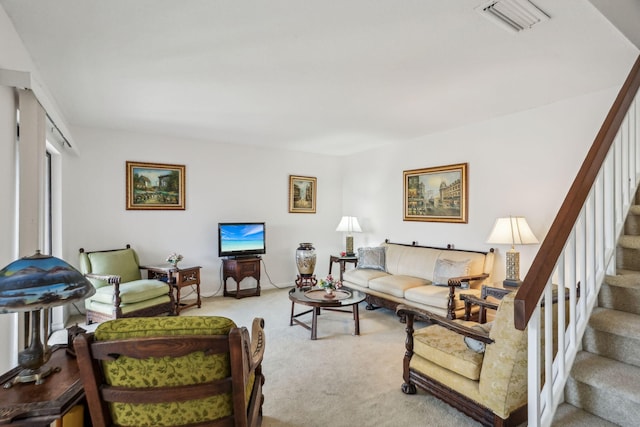 living room with light colored carpet